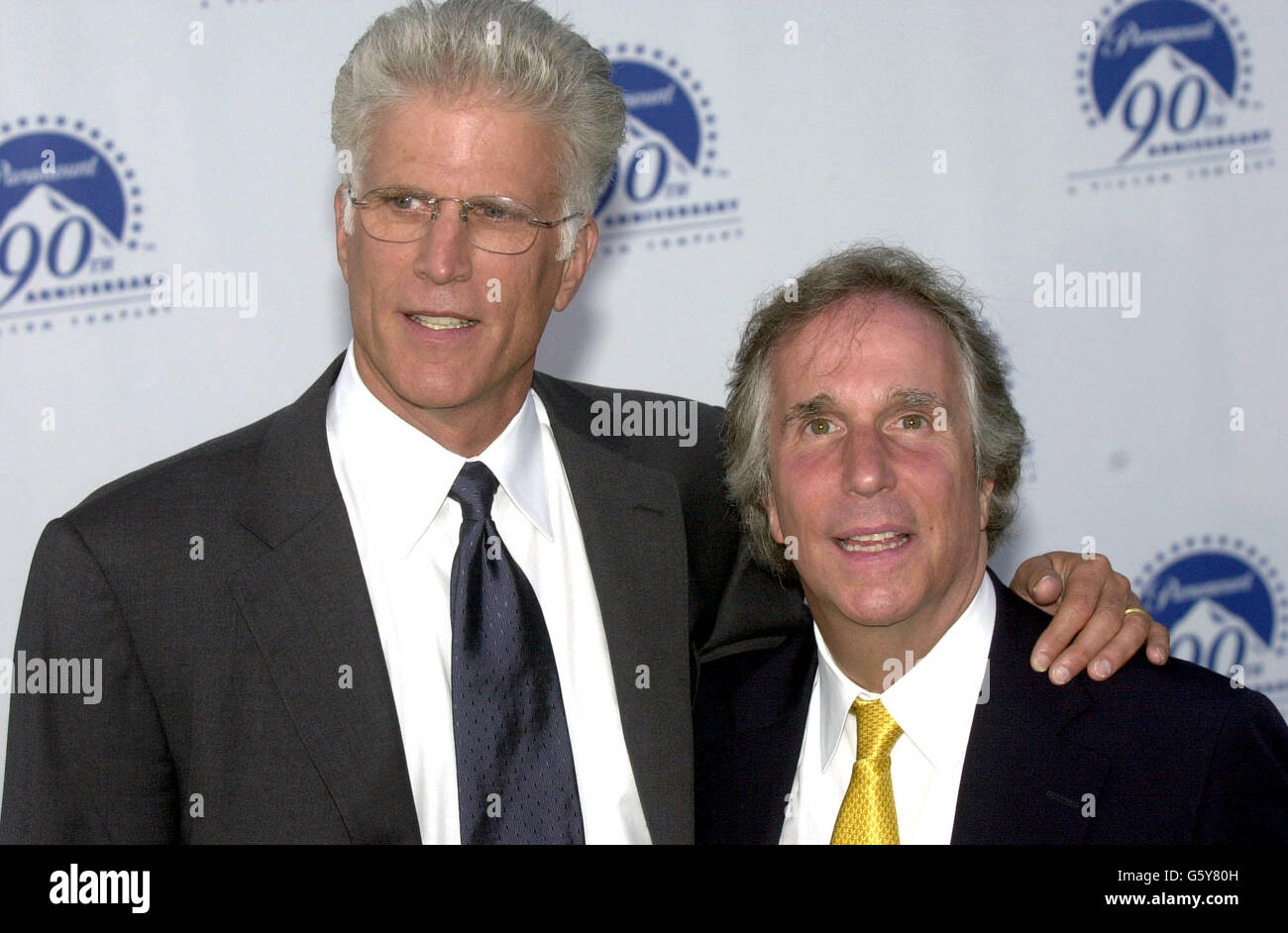 Actors Ted Danson (left) and Henry Winkler arrives for the Paramount Pictures 90th Anniversary party in Los Angeles. Stock Photo