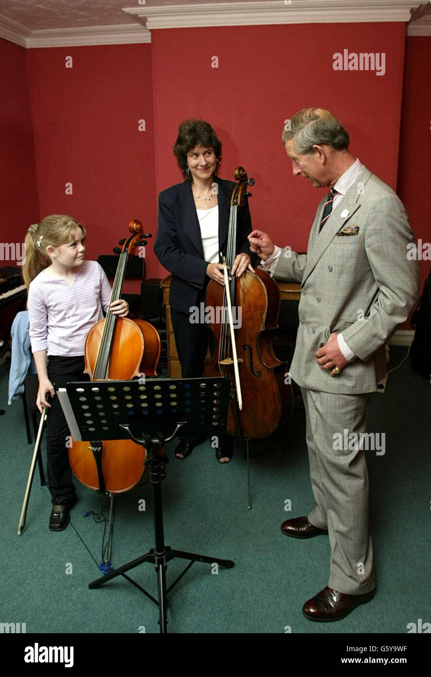 The Prince of Wales visits staff and pupils at the William Mathies Music Centre in Caernarfon where he was watching them perform at a concert in St Mary's Church. It was his third engagement of the day having visited Plas Mawr, a restored Elizabethan town house in the historic north Wales town of Conwy, where he was meeting local business leaders and the Euro DPC factory, in Llanberis, which produces healthcare diagnostic products and won the Queen's Award for Export Achievement four years ago. The visit was the Prince's last leg of his traditional three-day summer tour of the Principality. Stock Photo