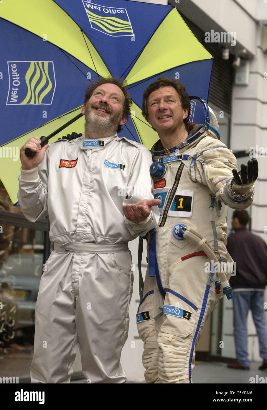 Balloonists Andy Elson (left) and Colin Prescot look despairingly at the skies, at the Royal Institute. * The two British pilots who plan to break the world altitude record for a manned balloon flight today began examining weather data for a 72-hour window to enable them to launch their balloon QinetiQ1 before hopefully soaring 25 miles (132,000ft) high. Stock Photo