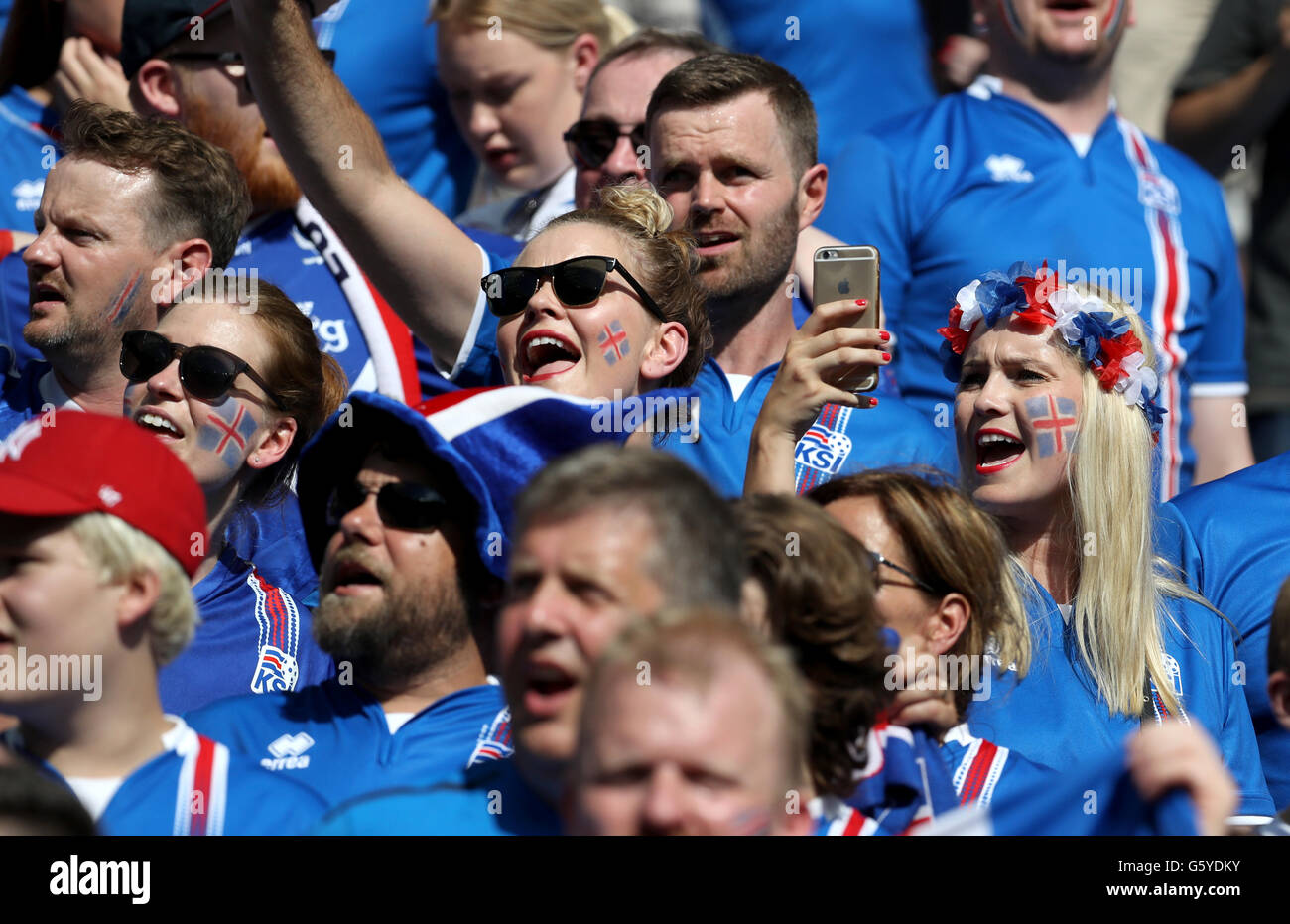 Iceland fans cheer on their side in the stands before the Euro 2016, Group F match at the Stade de France, Paris. PRESS ASSOCIATION Photo. Picture date: Wednesday June 22, 2016. See PA story SOCCER Iceland. Photo credit should read: Owen Humphreys/PA Wire. Stock Photo