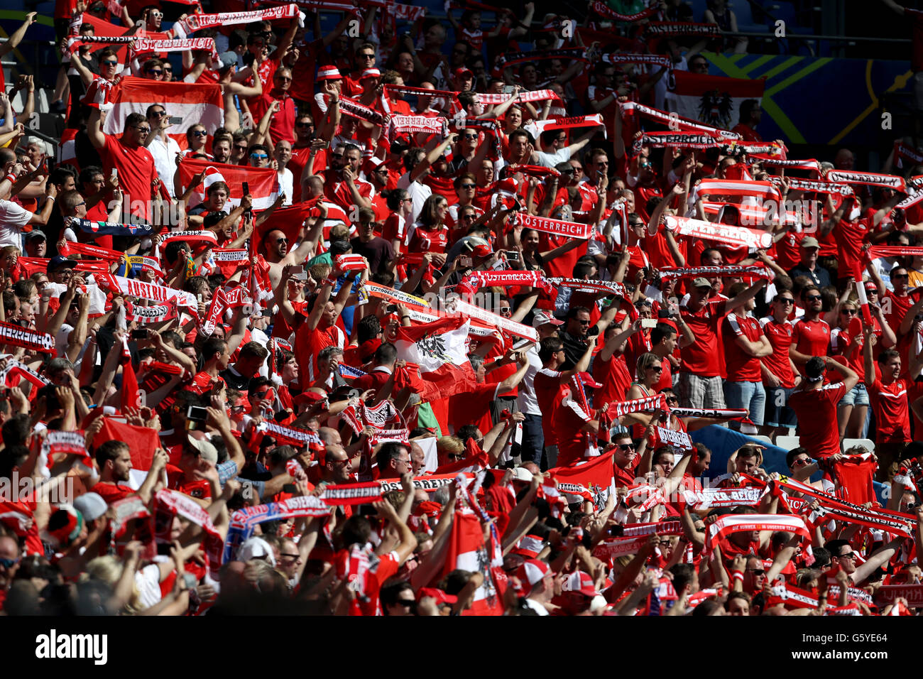 Austria fans cheer on their side in the stands before the Euro 2016, Group F match at the Stade de France, Paris. Stock Photo