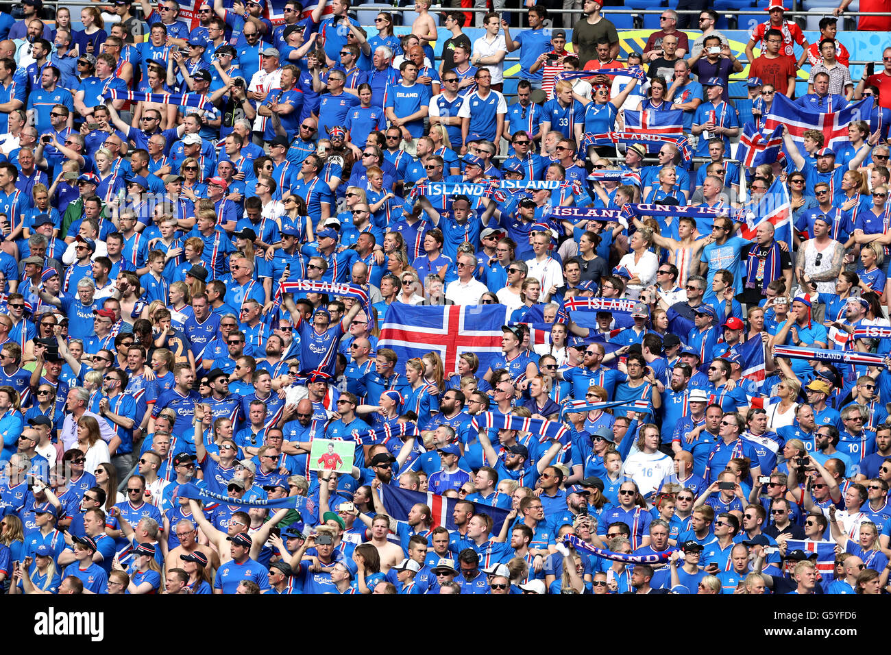 Iceland fans cheer on their side in the stands during the Euro 2016, Group F match at the Stade de France, Paris. Stock Photo