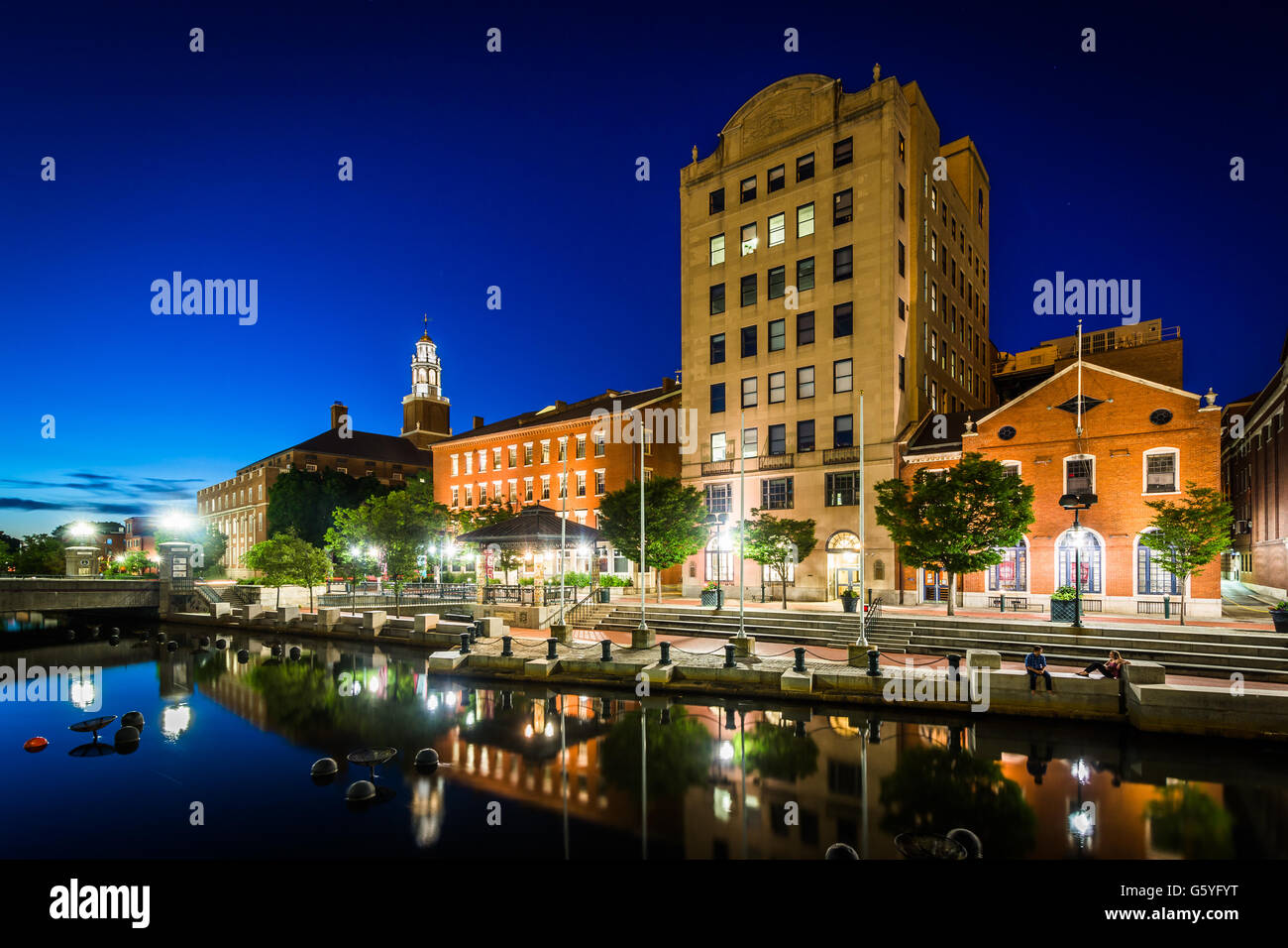 Historic buildings and the Providence River at night, in downtown Providence, Rhode Island. Stock Photo