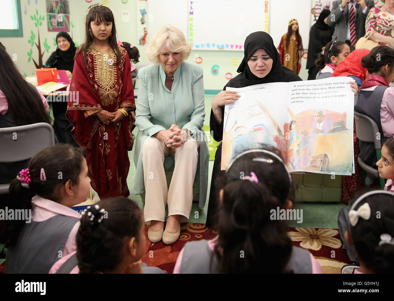 The Duchess of Cornwall talks with pupils as she visits the Amna Mahmoud Al Jeddah Primary Independant School for Girls on day four of the Royal tour to the Middle East in Doha, Qatar. Stock Photo