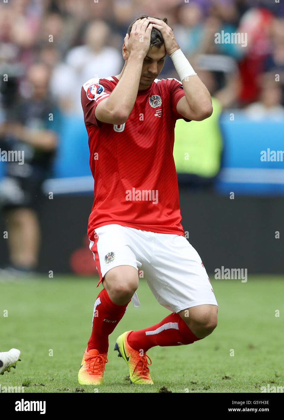 Austria's Aleksandar Dragovic dejected after missing a penalty during the Euro 2016, Group F match at the Stade de France, Paris. Stock Photo