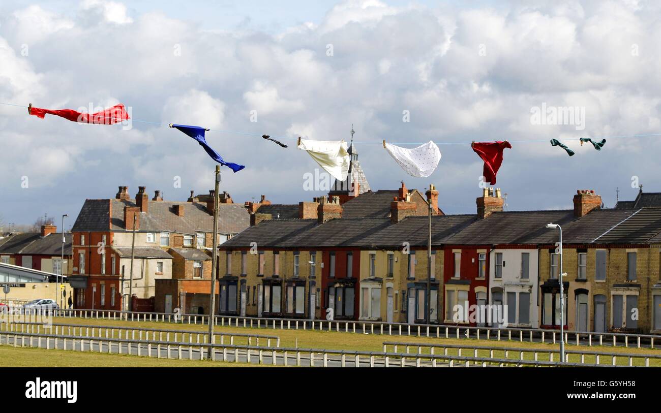 A 40 foot washing line complete with over sized washing has been installed in Liverpool. It was put together by local underground artist Maxdoubt and is designed to draw attention to the 1578 Life outdoor cinema event on Saturday 23 March. Stock Photo