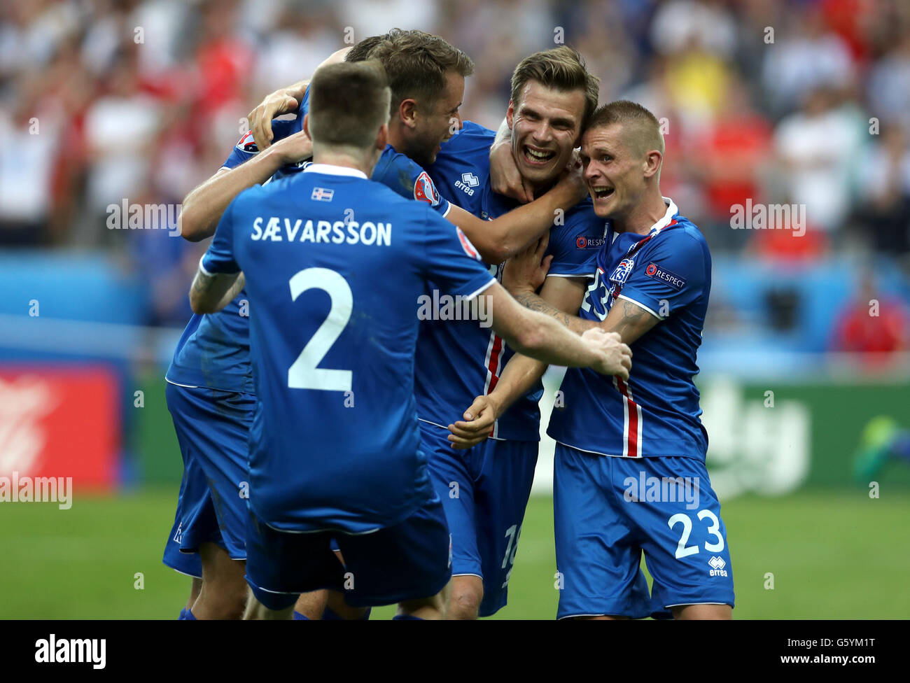 Iceland players celebrate their late winner and qualifying for the last 16 round during the Euro 2016, Group F match at the Stade de France, Paris. Stock Photo