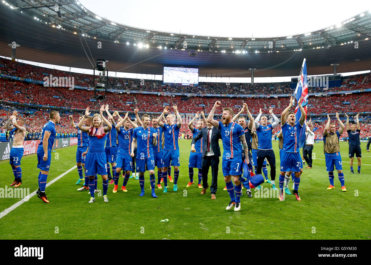 Iceland players celebrate their late winner and qualifying for the last 16 round after the Euro 2016, Group F match at the Stade de France, Paris. Stock Photo