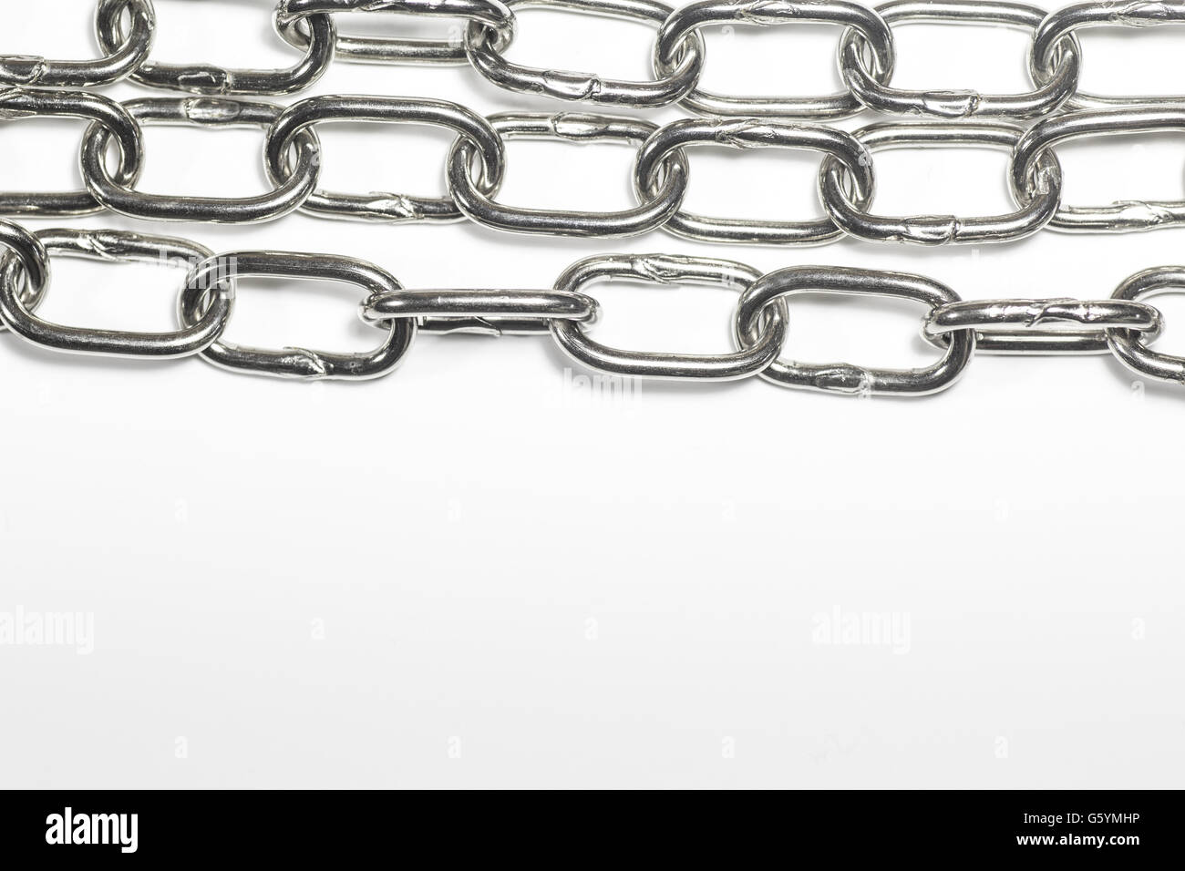 3 pieces of chain along top of image Stock Photo