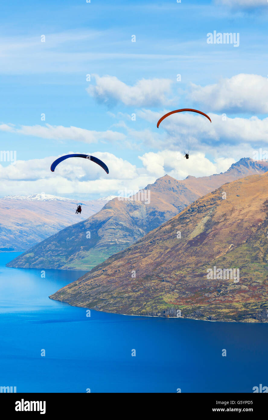 Paragliding over Lake Wakatipu, Queenstown, South Island, New Zealand Stock Photo