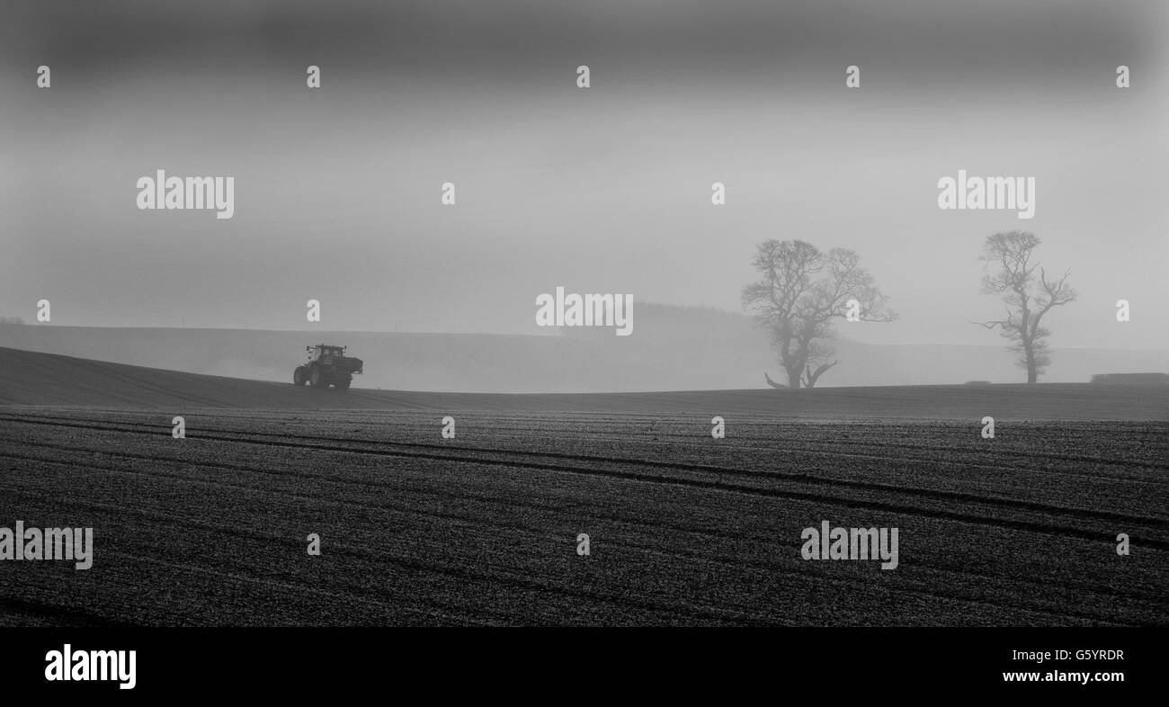 Tractor in field Black and White Stock Photos & Images - Alamy
