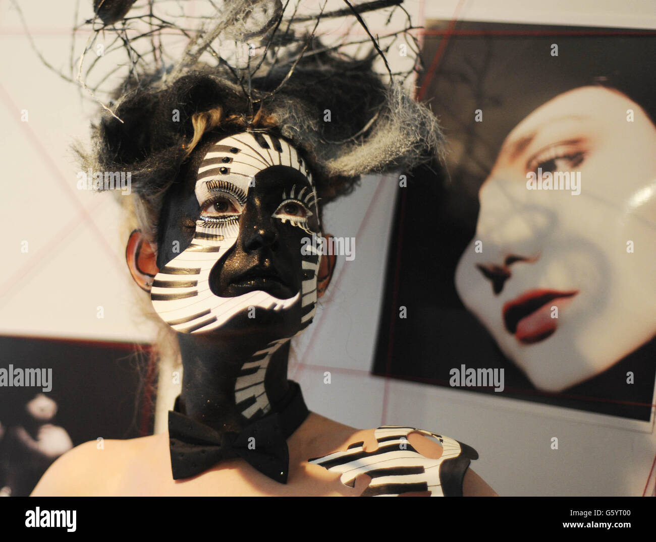 Model Sarah Burns is painted with a musical theme during