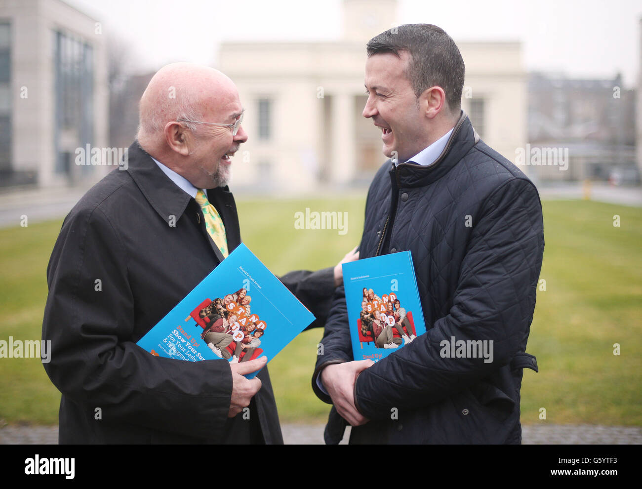 Education Minister Ruairi Quinn (left) and Cork GAA sport star Donal Og Cusack (right) pictured at the launch of Stand Up! Awareness Week on Homophobic and Transphobic Bullying at the Department of Education in Dublin. Stock Photo