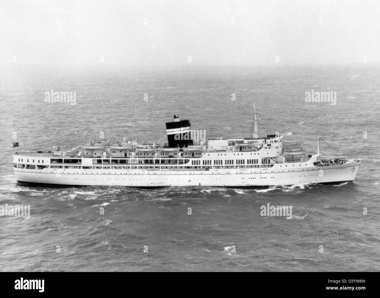 Stock picture of the P&O cruise ship SS Uganda. She has had her Mediterranean schools cruise cut short and has been requisitioned by the navy as a hospital ship for the Falklands War. She was built in 1952 on the Cylde and entered her current role in 1972, retaining her British India Steam Navigation Company livery, in which she began her educational cruise career in 1968. Stock Photo