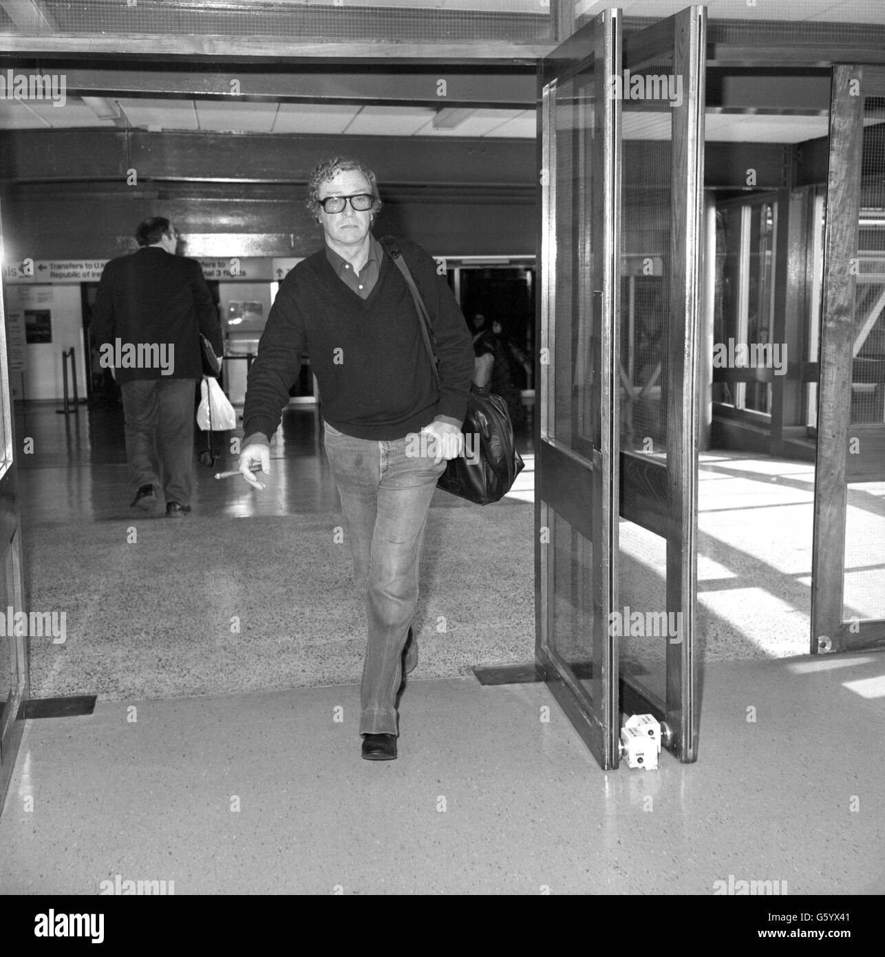 Film - Michael Caine - Heathrow Airport, London Stock Photo
