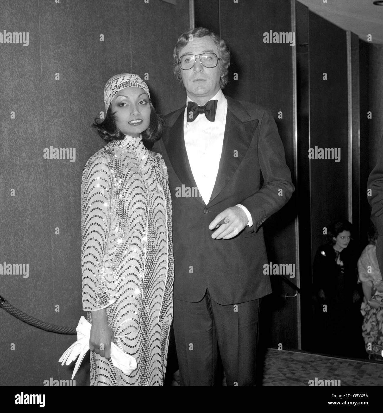 Actor Michael Caine with his wife Shakira arrive for the premiere of his latest film ''The Man Who Would be King'. Stock Photo