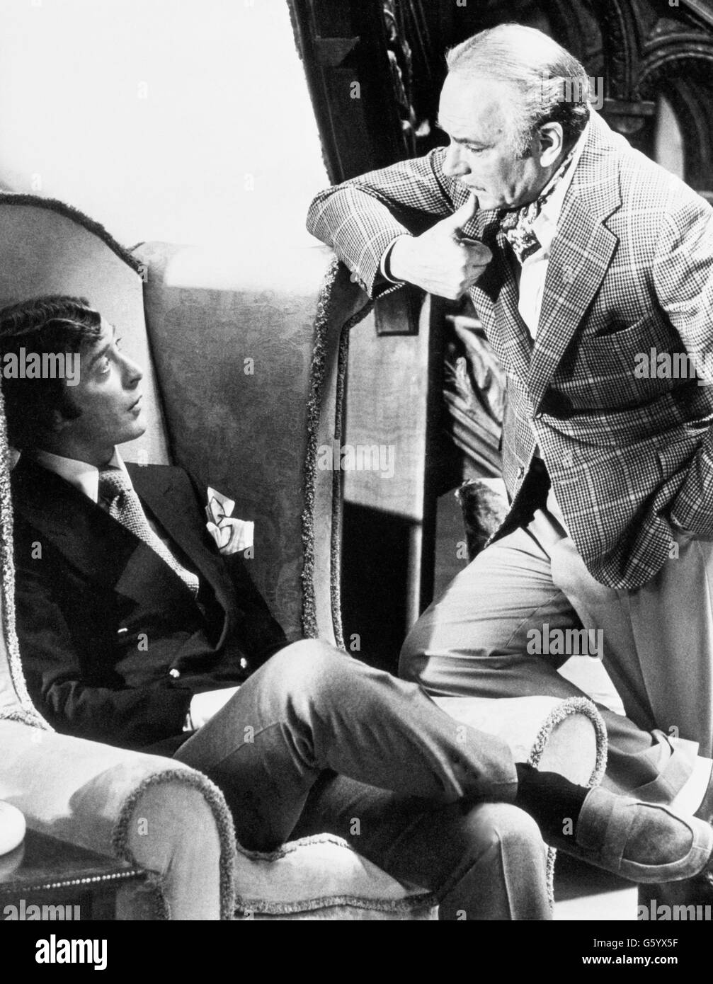 Actors Michael Caine and Laurence Olivier, who star in Sleuth, a film version of Anthony Shaffer's hit play, rehearse a scene at Pinewood Studios. Sleuth is being directed by Joseph L. Mankiewicz and produced by Morton Gottlieb for release by 20th Century Fox. Stock Photo