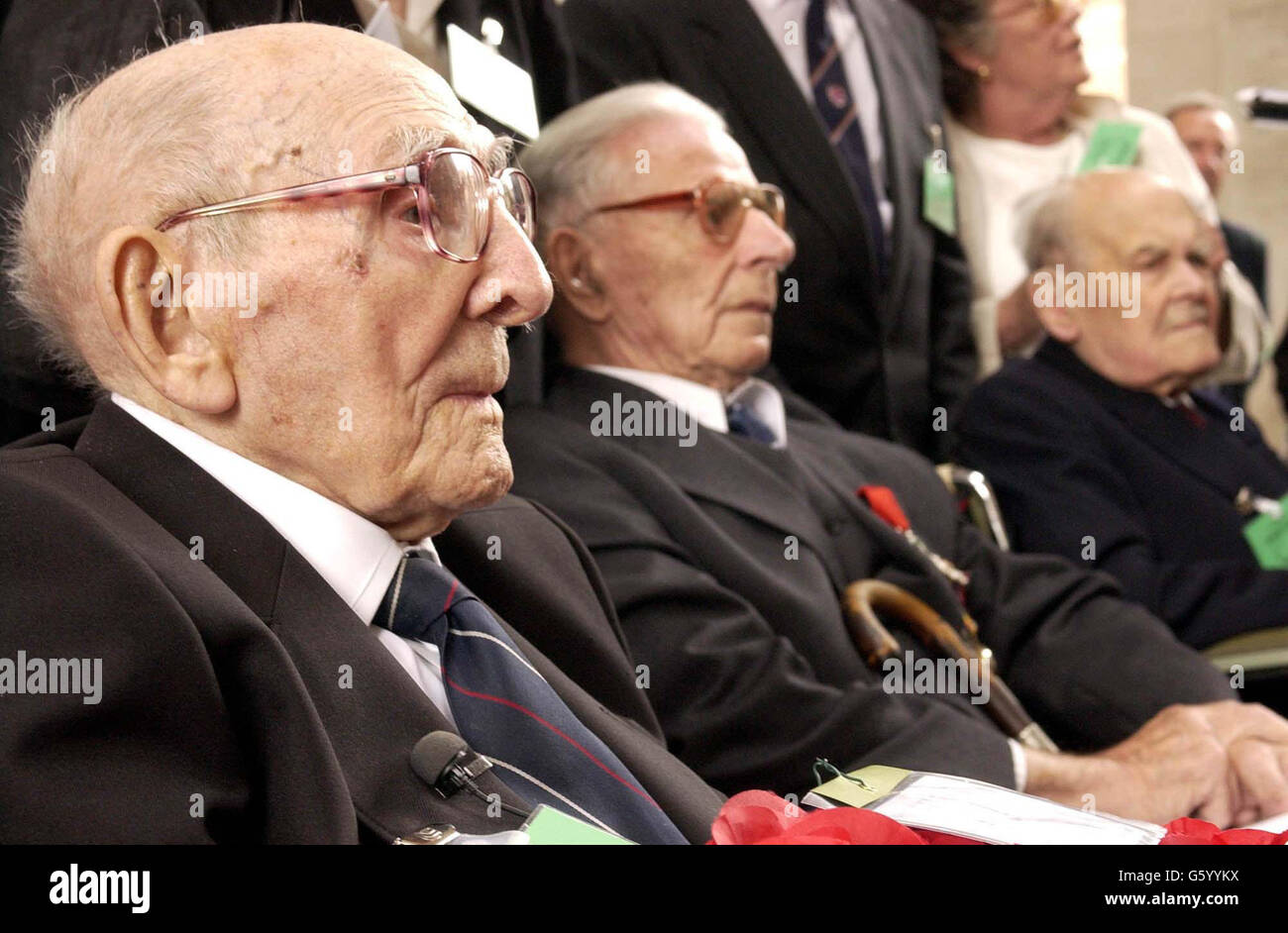 Jack Davis (left), a 107 year old veteran of the First World War from Stoke Hammond, Buckinghamshire, attends the ceremony at the Menin Gate, Ypres Belgium to mark its 75th Anniversary. *Jack visited the gate, which was was built to mark the estimated 54,000 Commonwealth soldiers posted as missong, whose graves are not known, with two other centenarian veterans, Harry Patch (centre), 104 from Wells, Somerset, and Arthur Halestrap (right), 103 from Kings Sutton in Oxfordshire. Stock Photo