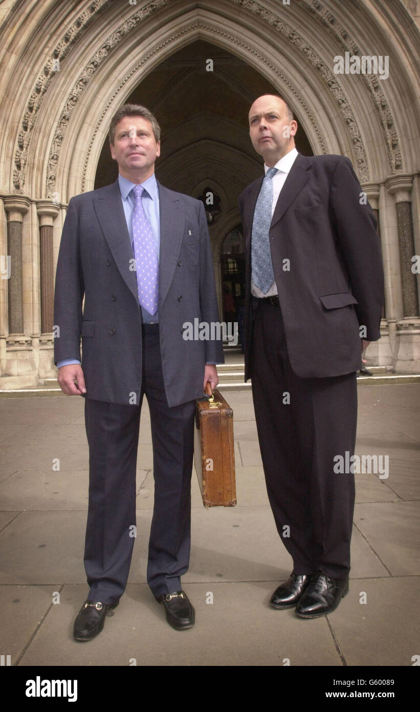 Keith Harris (left), Chairman of the Football League and Football League Chief Executive David Burns arrive at the High Court in London A High Court judge was today being asked to rule on the Football League's 178.5 million claim over the collapse of ITV Digital. * The League alleges that the TV channel's owners, Carlton Communications and Granada Media, are liable for money still owed to Nationwide League clubs under a broadcasting contract. But Carlton and Granada argue that no agreement was ever made regarding parent company guarantees. Stock Photo