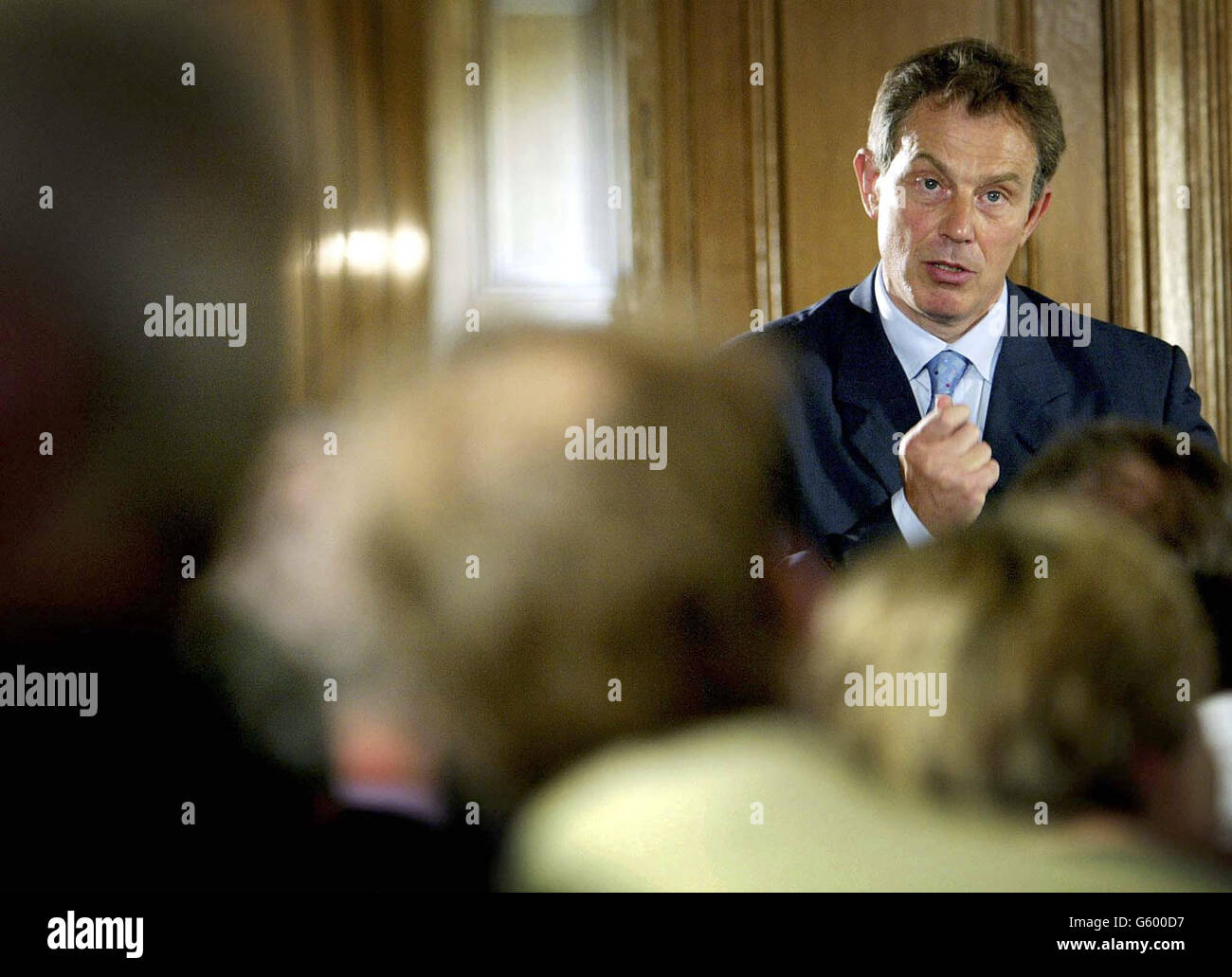 Prime Minister Tony Blair talks to journalists during a new style press briefing inside Downing Street. Blair said on Thursday an attack on Iraq was not imminent but held out little hope for negotiations about weapons inspectors returning. Stock Photo