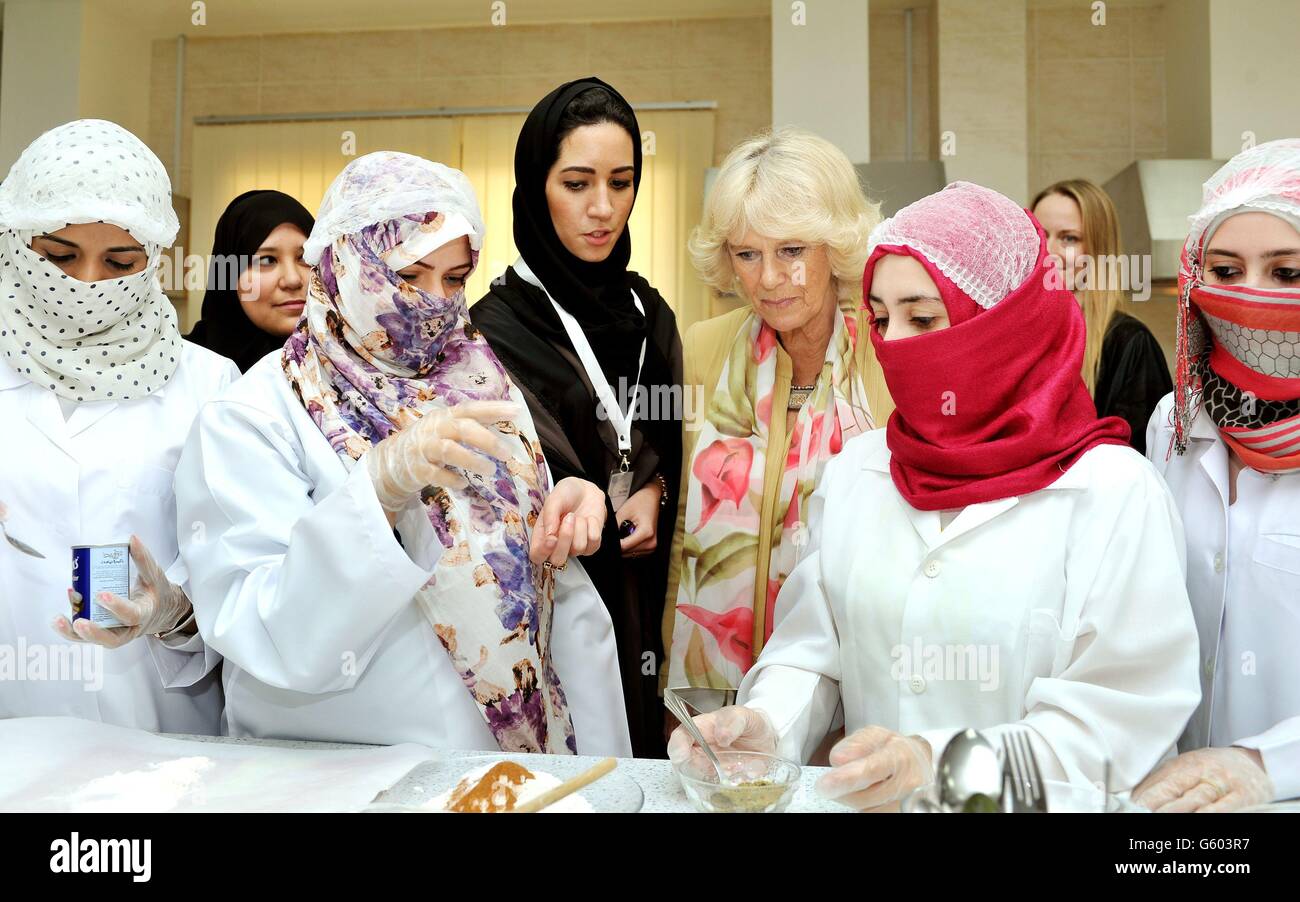 The Duchess of Cornwall meets women who are learning cooking skills at the Bab Rizq Jameel Nafisa Shams Female Academy for Arts and Crafts, in the city of Jeddah in western Saudi Arabia. Stock Photo