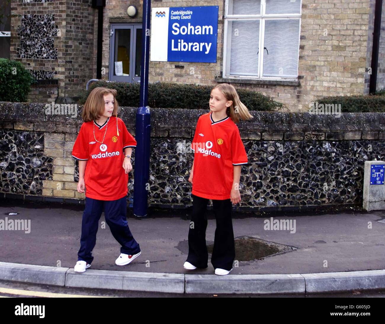 Two child actors, playing Jessica Chapman, left, and Holly Wells, walk ...