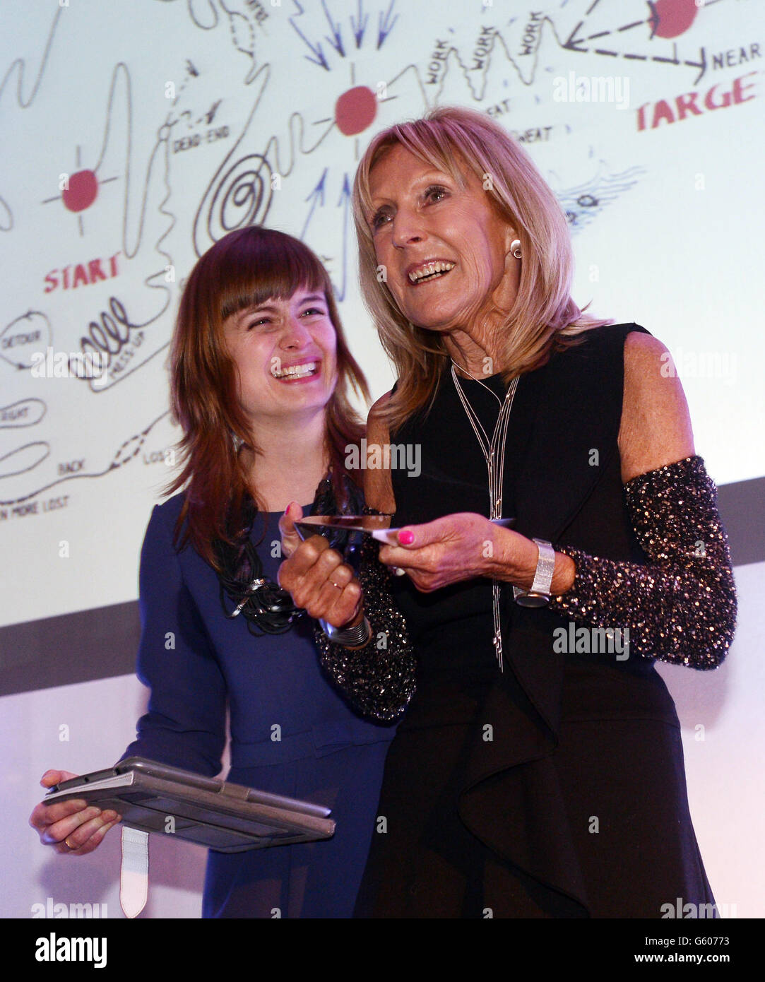 Czech born architect Eva Jiricna receives the Jane Drew prize from Architects' Journal editor, Christine Murray (left) at the Architects' Journal, Women in Architecture Awards luncheon at The Langham Hotel, in London. Stock Photo