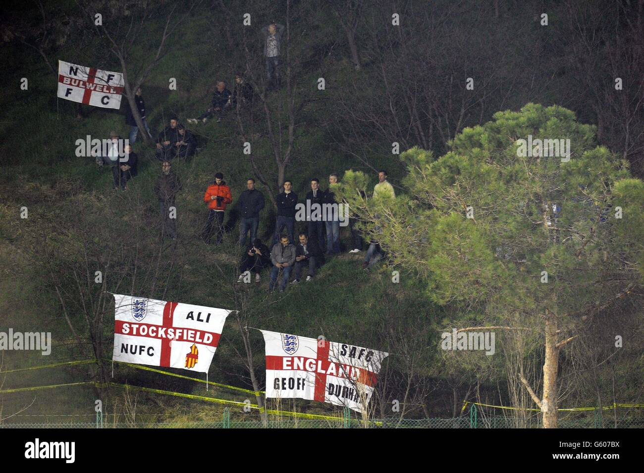 England Fans get ready to watch from a hill looking over the stadium, before the 2014 World Cup Qualifier at Serravalle Stadium, Serravalle, San Marino. Stock Photo