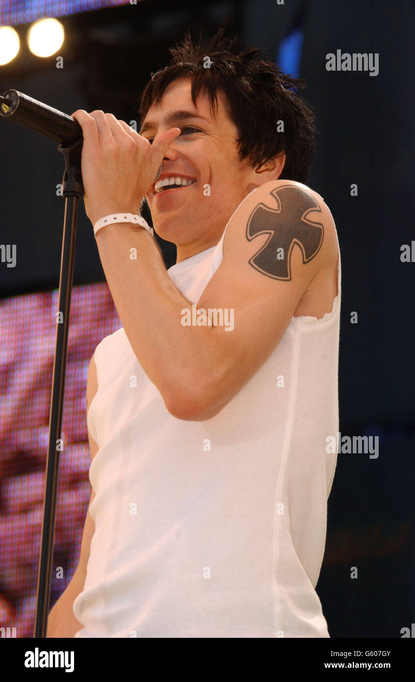 Tony Vincent, who plays Galileo in the Queen Musical 'We Will Rock You'  performing on stage during the 95.8 Capital Radio Party in the Park, in  Hyde Park, London, in aid of