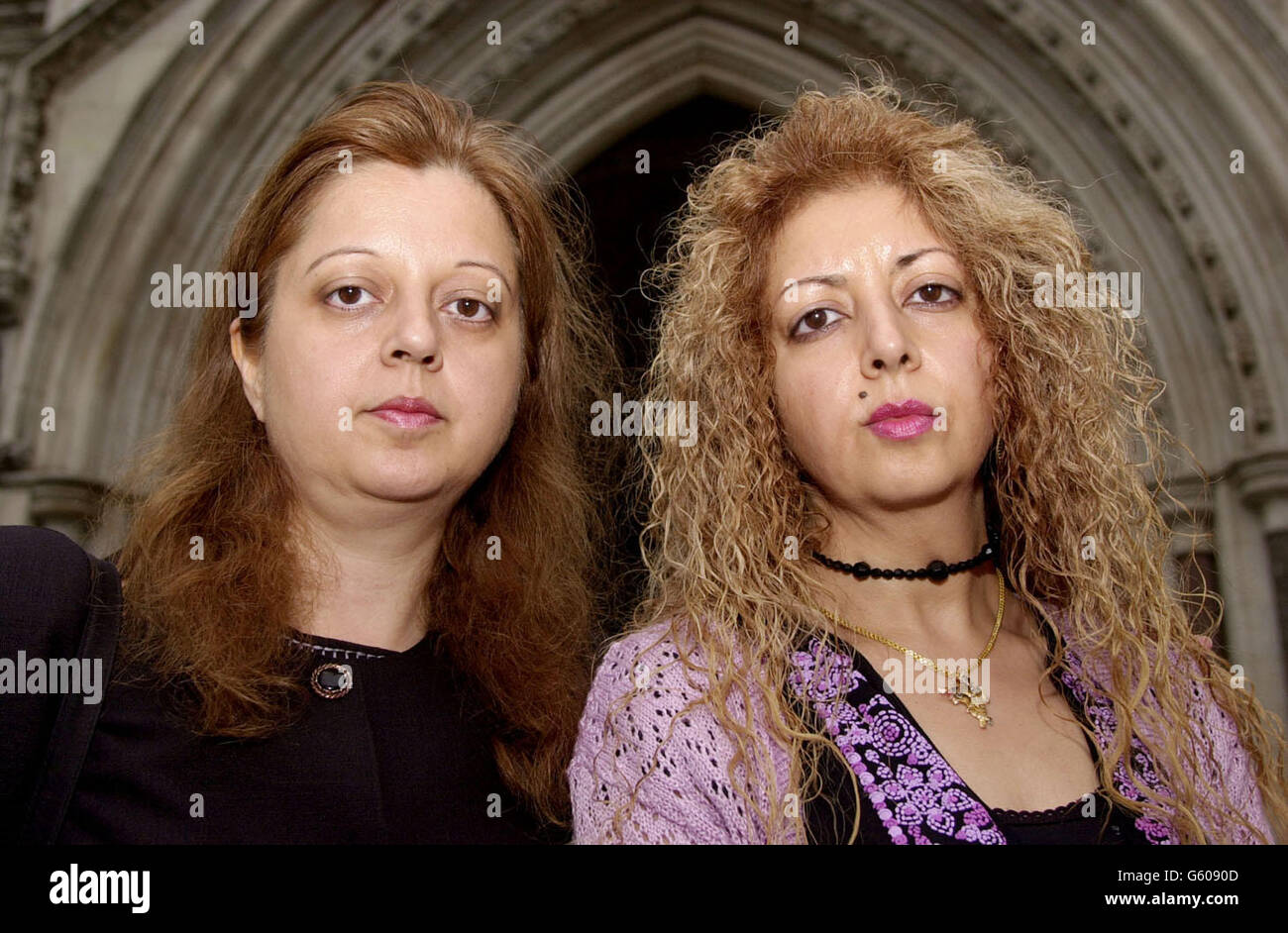 Sadhana Chaudhari (right) stands outside the Royal Courts of Justice in central London, with her sister Neelu Berry. Mrs Chaudhari, a science teacher, is applying to the Court of Appeal to overturn the court's decision to refuse her a judicial review. * and to try and determine the causes of the death her daughter Sunaina, who died on October 26, 2001, at the age of five months. Mrs Chaudhari claims that a 'Do Not Resuscitate' order was recorded in the medical notes of her daughter suffered from a rare chromosomal abnormality, at King George Hospital in Goodmayes, Essex. Stock Photo