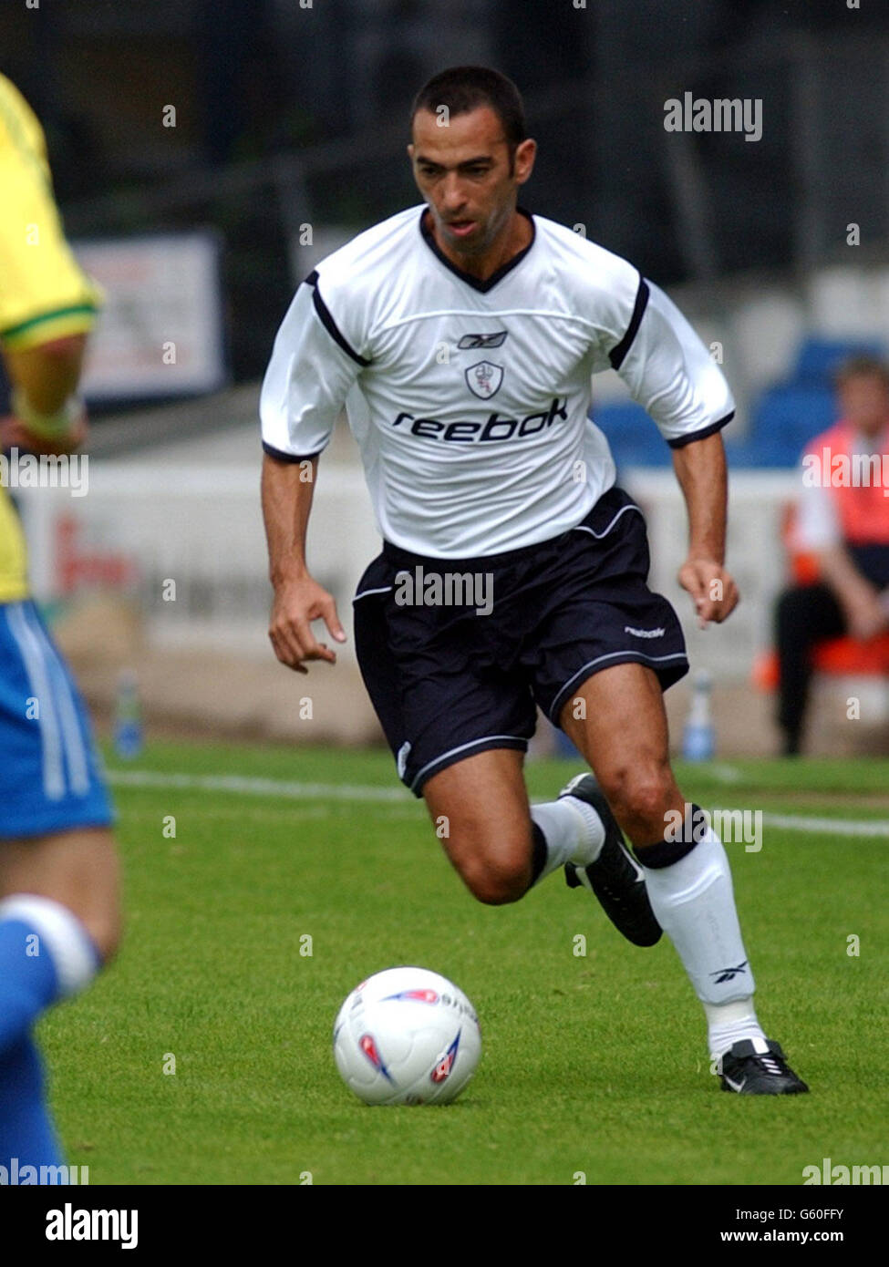 Youri Djorkaeff in action for Bolton Wanderers during their pre-season friendly game between Cardiff City and Bolton Wanderers at Ninian Park, Cardiff. Stock Photo