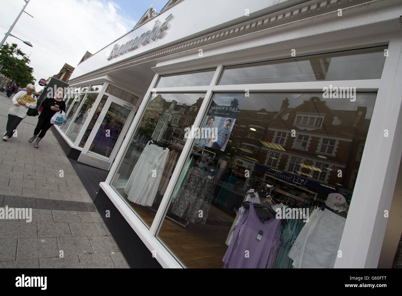 Bonmarche fashion shop store in High Street, Southend on Sea, Essex, UK  with sale signs in shop window. Half price, mega deals. Passers by Stock  Photo - Alamy