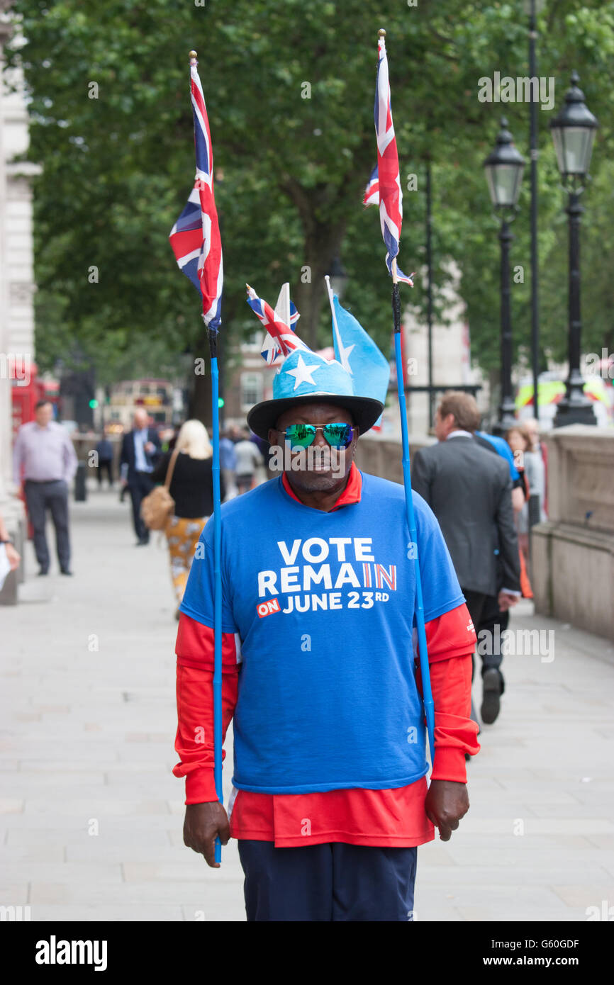 Brexit Referendum. Vote Remain supporter in Westminster London with Union Jack flags Stock Photo