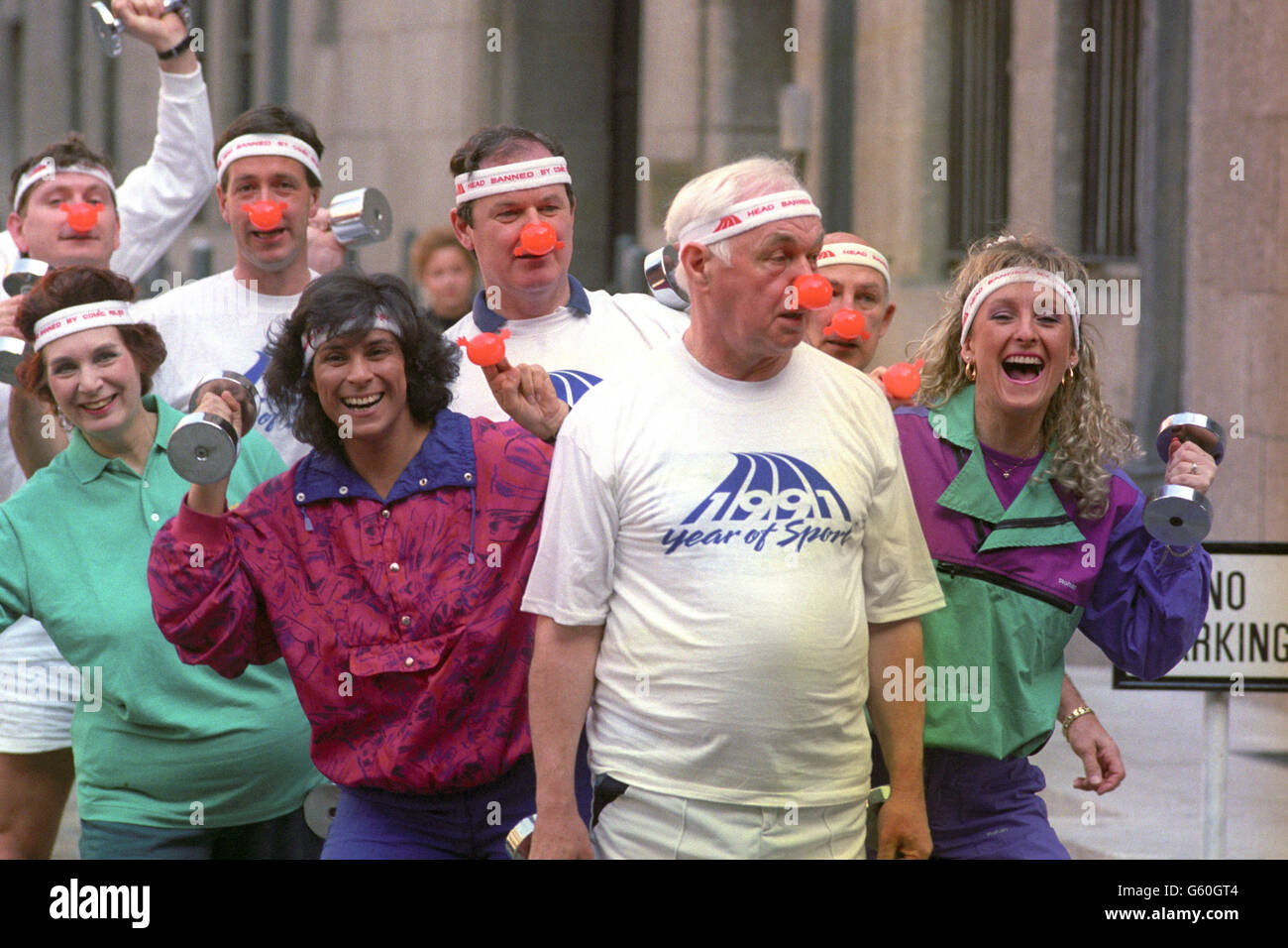 MPs and sports personalities wearing their red noses for Week of Sport, to raise money for Comic Relief. From left, Dame Janet Fookes, Fatima Whitbread, Sir Fergus Montgomery and Liz Hobbs. Stock Photo