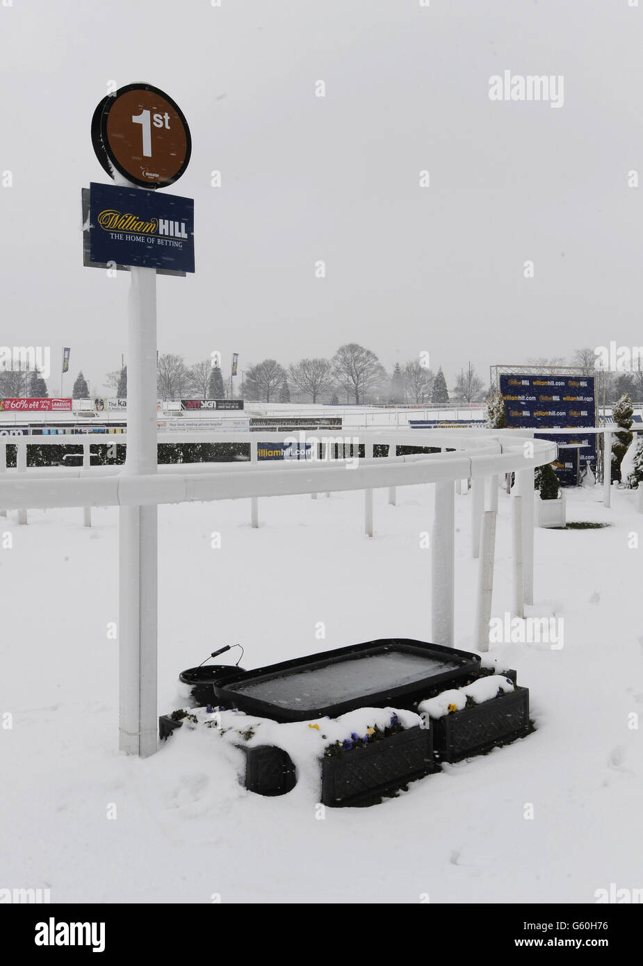 A snowy scene in the winner's enclosure as day two of the William Hill Lincoln Meeting at Doncaster Racecourse has been cancelled due to snow. Stock Photo