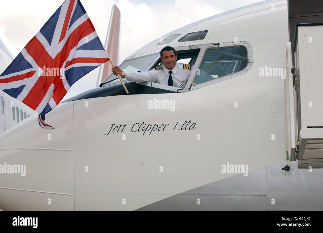 John Travolta at Heatrow Airport Stock Photo