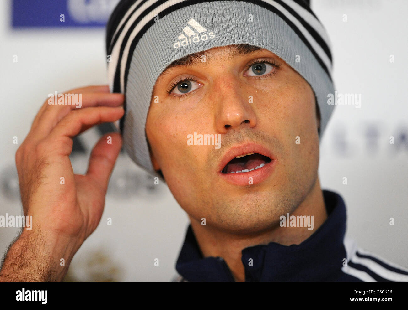 Russia's Roman Shirokov answers questions during the pess conference. Stock Photo
