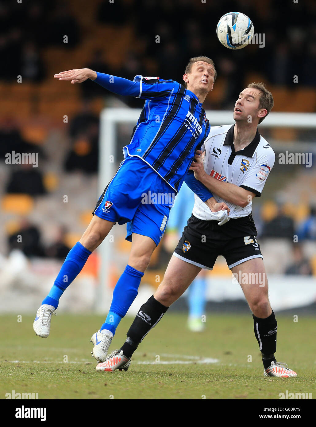 Cheltenham Town's Paul Benson (left) and Port Vale's John