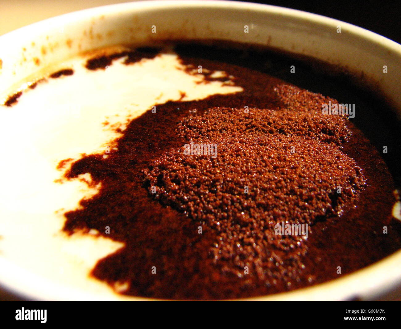 Coffee powder and milk in a cup Stock Photo Alamy