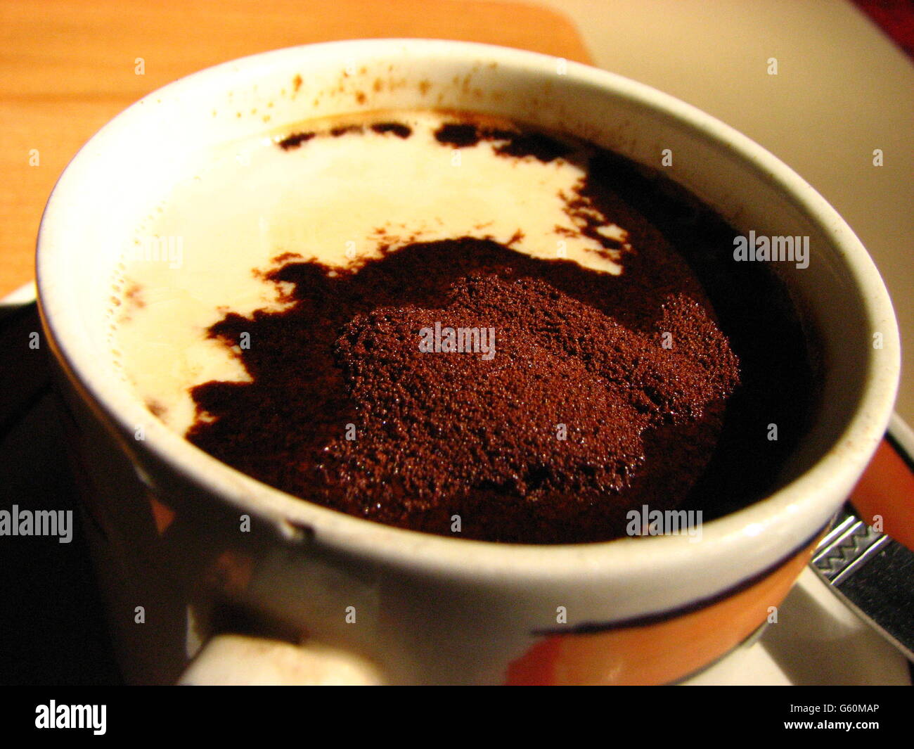 Coffee powder and milk in a cup Stock Photo Alamy