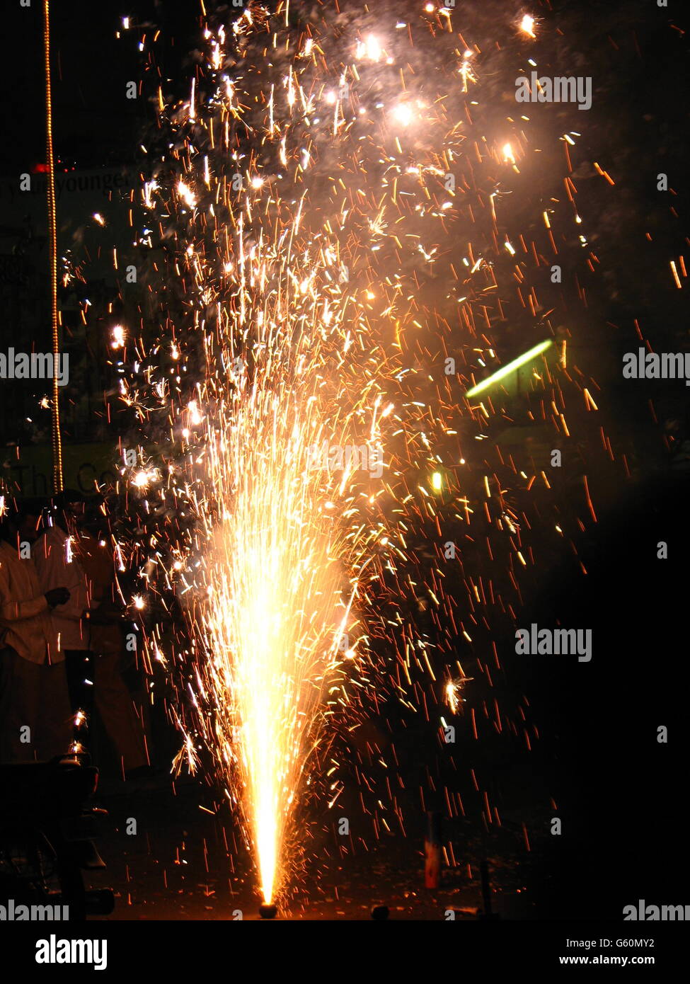 Diwali Fireworks exploding on a street in India Stock Photo