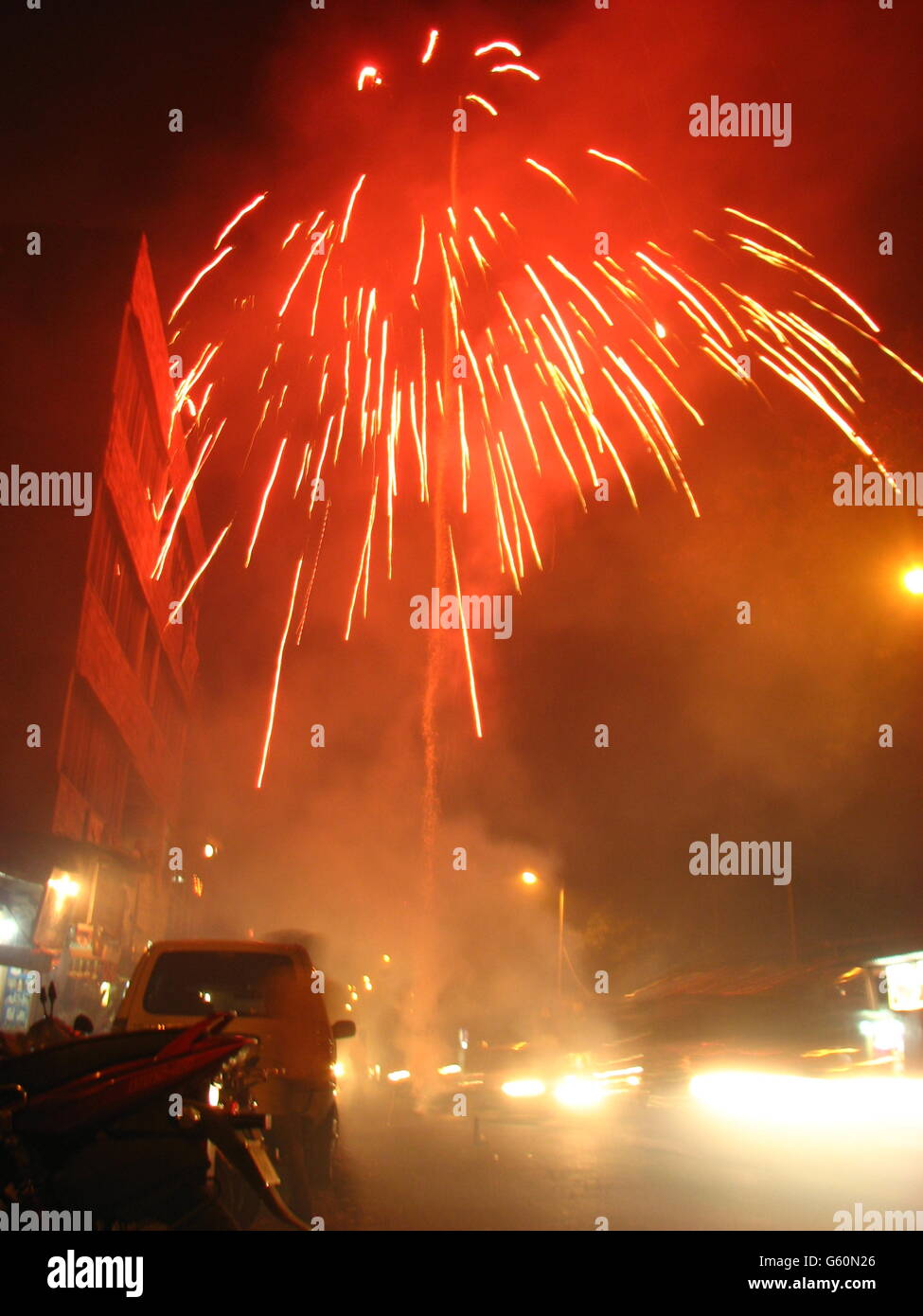 Diwali Fireworks exploding on a street in India Stock Photo