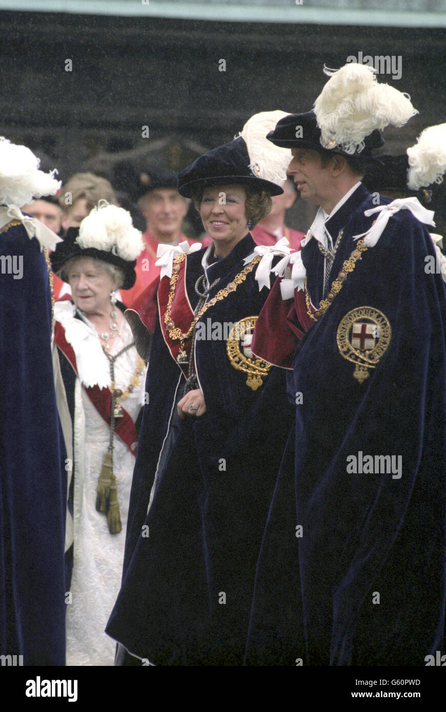 Queen Beatrix of the Netherlands with the Duke of Kent outside St George's Chapel, Windsor, for the Order of the Garter ceremony. Stock Photo