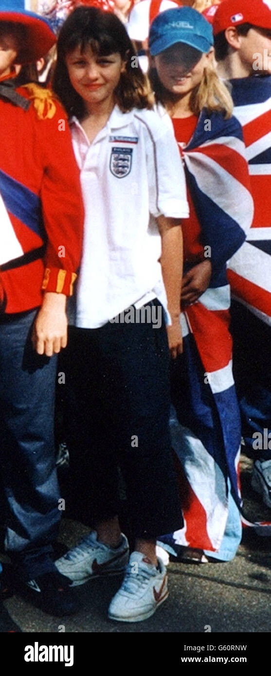 Jessica Chapman (left) and her best friend, Holly Wells, both 10 and who disappeared from Soham, Cambridgeshire late on Sunday, pictured in June at their school jubilee party. *Police say the last positive sighting of them was near their homes on the main road into Soham at around 6.30pm on Sunday, but a woman has said that she saw girls who matched Holly's and Jessica's description walk past her house in Little Thetford, Cambridgeshire, at 6.45am on Monday. Both the missing girls were dressed in identical replica red Manchester United football shirts with the name Beckham and the number Stock Photo