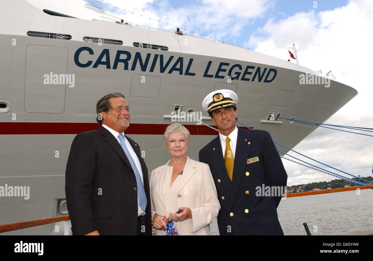 Carnival CEO Micky Arison, actress Dame Judi Dench and the ship's captain Claudio Cupisci, during a ceremony at Harwich International Port in Essex to officially name the 'The Carnival Legend'. Stock Photo
