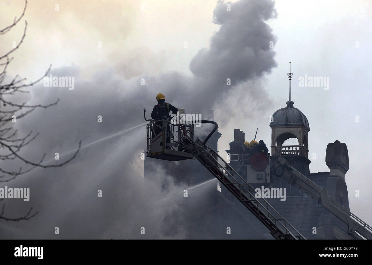 Firefighters attend the blaze at at the Newington Library on Walworth Road, Southwark, London. Stock Photo