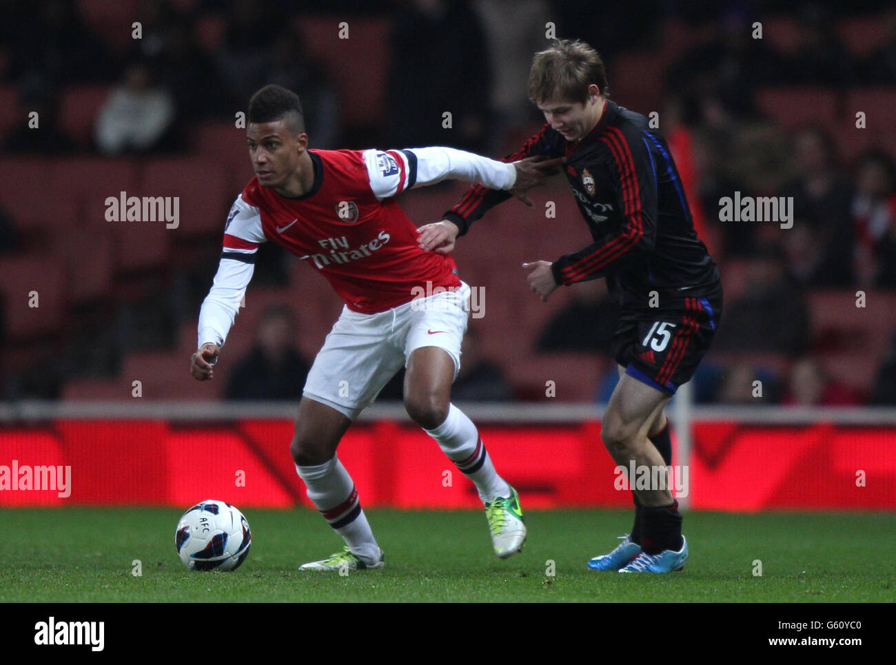 Arsenal's Martin Angha (left) battles for possession of the ball with PFC CSKA's Dmitry Efremov (right) Stock Photo