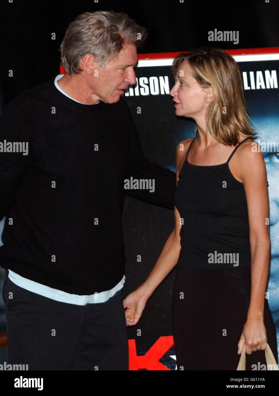 Harrison Ford and his girlfriend Calista Flockhart arrive at Lido, Venice, for the 59th International Venice Film Festival. Stock Photo
