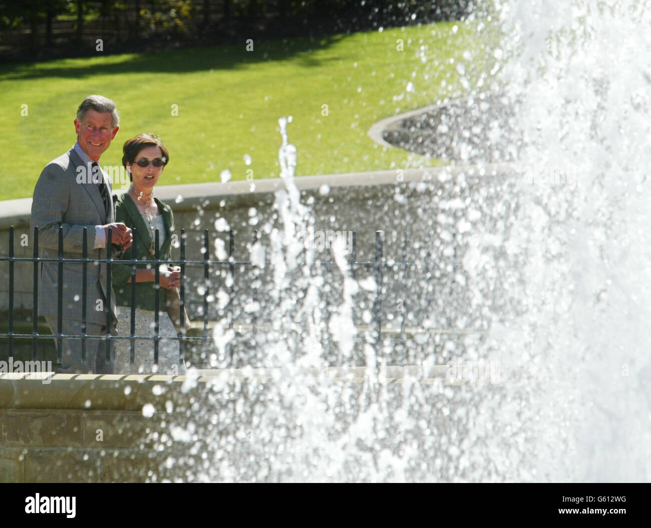 The Prince of Wales walks through Alnwick Gardens with the Duchess of Northumberland after he opened the historic walled garden in the grounds of her estate as part of a seven-year 14milliom project she is planning to restore the property to its former glory. * A central feature of the garden is a huge cascade of water, complete with fountains, which are believed to be the largest of its kind in this country. It took 150,000 man hours to complete and 7,260 gallons of water tumble down its 30 weirs every minute. Since the garden opened to the public in October last year almost 250,000 visitors Stock Photo