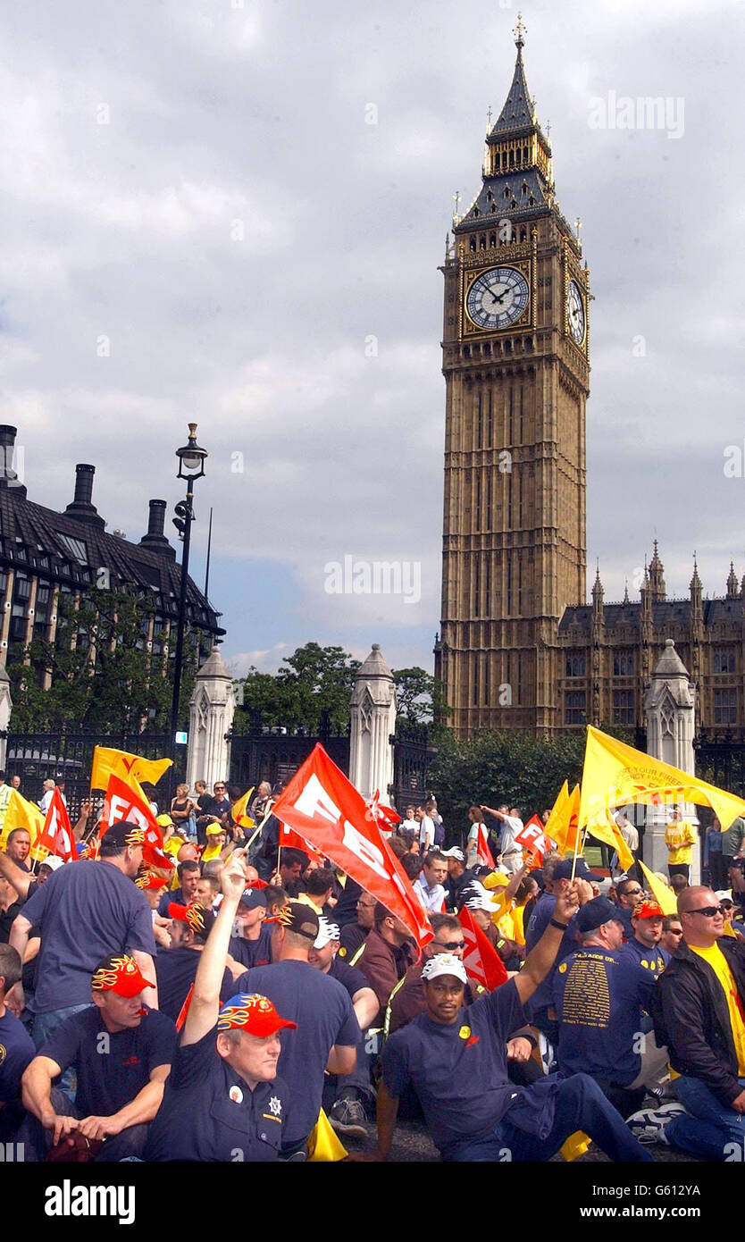 Firefighter Rally Firefighters sit on the road infront of Big Ben (background) during a ...
